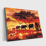 The sight of paintings by elephants, strolling through the grassland at dusk is breathtaking, with incredibly vivid and rich colors. Elephants and grasslands are blanketed in golden shadows as the last of the setting sun dips below the gorgeous, fiery orange sky. Because each hue evokes a different feeling, you can experience the allure of the natural world and become completely absorbed in the splendor of the setting sun.